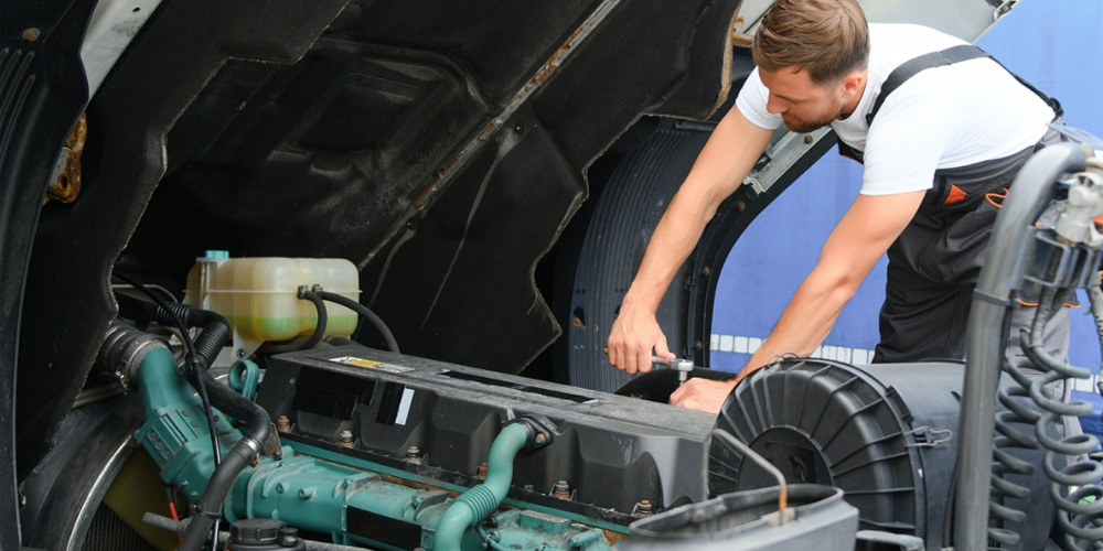 Image of Mechanic Fixing A Truck